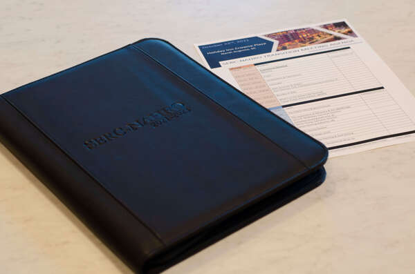 DSC8051.jpg Leather portfolios and portable chargers were provided by the Augusta Affordable Housing Corporation