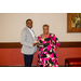 A man and a women posing with one of the SERC-NAHRO awards.