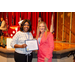 Two women posing with a SERC-NAHRO award.