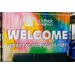 A colorful banner with the words Back Pack Beginnings: Welcome We're Excited You're Here!