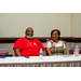 A man and a woman sitting at a table.