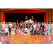 A huge group photo of everyone in costume at the Decades Dinner.