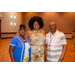 A man and two women taking a group photo.