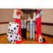 Two women smiling excitedly inside the Housingopoly jail photo booth.