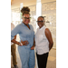 A wide shot of two women posing in the International Civil Rights Center and Museum.