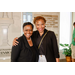 Two women in front of the Donor Wall Presented by Greensboro North Carolina inside the International Civil Rights Center and Museum.