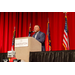 President Anthony Goodson, Jr. speaking to a crowd while behind a podium.