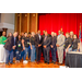 President Anthony Goodson, Jr. standing in the middle of a big group photo.