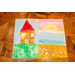 A What Home Means to Me Poster that is split in two. One half depicts a house on a hill and the other depicts a beach.