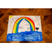 A What Home Means to Me Poster with a giant rainbow with the words follow your dreams and be kind to others.