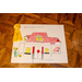 A What Home Means to Me Poster third place winner with a house with a red roof, a red, car, and some yellow flowers.